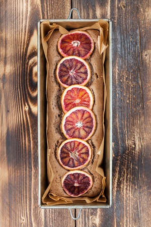 Healthy and delicious spelt cake with blood orangesの写真素材