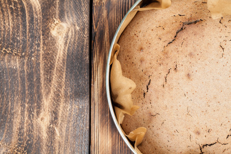 Healthy spelt cake in a round baking sheetの写真素材