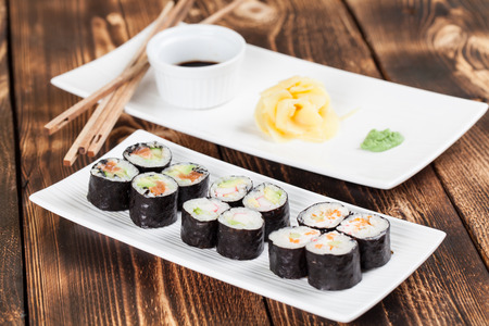 Maki sushi set with ginger, wasabi and soy sauce. Shallow dofの写真素材