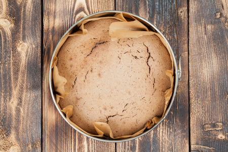 Healthy spelt cake in a round baking sheetの写真素材
