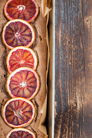 Healthy and delicious spelt cake with blood orangesの写真素材