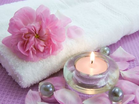 Body relax composition with aroma candles and petals of rose の写真素材