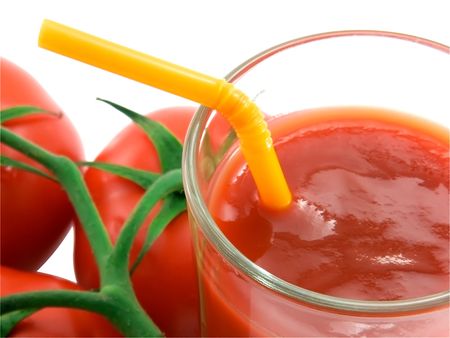 Tomato juice and tomato close-upの写真素材