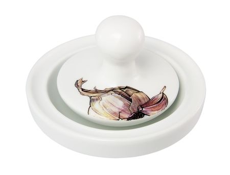 Porcelain mortar for grinding spices on a white background close-upの写真素材