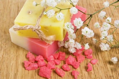 Natural handmade herbal soap, aromatic bath salt and flowerの写真素材