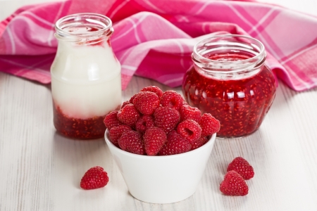Raspberry in white bowl, homemade yogurt and jam の写真素材
