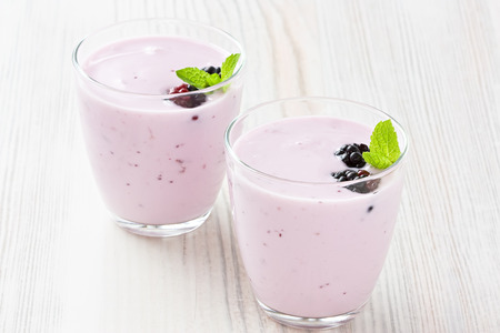 Fresh yogurt with sweet dewberry for healthy breakfastの写真素材