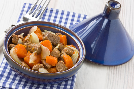 Delicious beef stew with pumpkin and onion in tajine potの写真素材