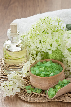 Aromatic sea salt, essential oil and towel for SPA, massage and relaxの写真素材