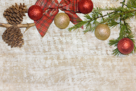 Christmas postcard frame on wooden background. For greeting card. Red, golden and white. Xmas wallpaper, Magenta, red, green blue.の写真素材