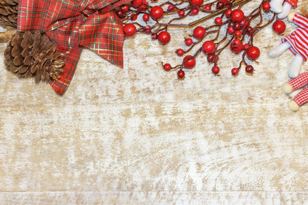 Christmas postcard frame on wooden background. For greeting card. Red, golden and white. Xmas wallpaperの写真素材