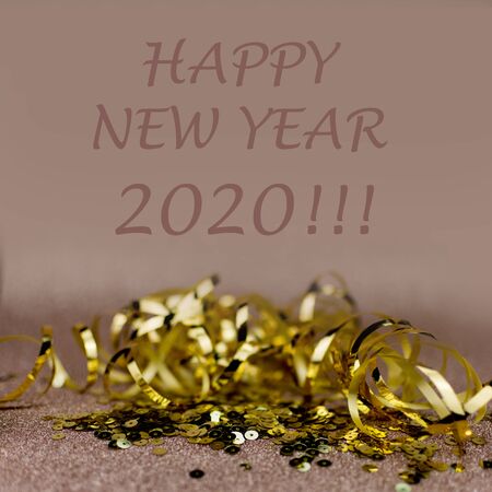 New Year 2020 greetings card. Glitter and bokeh effects on background.の写真素材