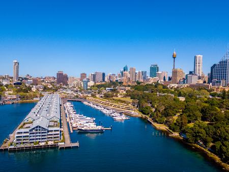 Amazing aerial view of the Sydney city from above with Harbour bridge, Opera house ant the harbour.のeditorial素材