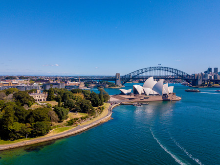Amazing aerial footage view of the Sydney city from above with Harbour bridge, Opera house ant the harbour. April 10, 2016. Sydney, Australia.のeditorial素材