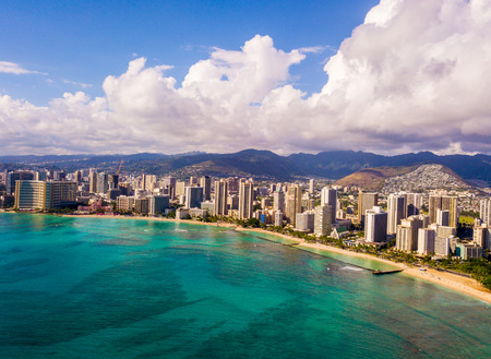 Honolulu, Hawaii. Aerial skyline view of Honolulu, Diamond Head volcano including the hotels and buildings on Waikiki Beach.の写真素材