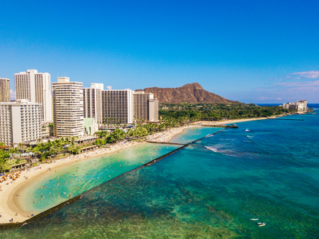 Honolulu, Hawaii. Aerial skyline view of Honolulu, Diamond Head volcano including the hotels and buildings on Waikiki Beach.の写真素材