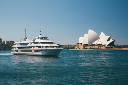Amazing Sydney Opera house by the bay with yachts swimming by. Sydney, Australia. August 30, 2017.のeditorial素材