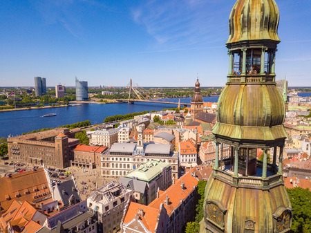 Beautiful aerial Riga view from above with golden rooster on the top of the St. Peters church and old town of Vecriga.のeditorial素材