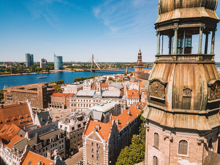 Beautiful aerial Riga view from above with golden rooster on the top of the St. Peters church and old town of Vecriga.のeditorial素材