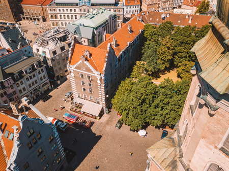 Beautiful aerial Riga view from above with golden rooster on the top of the St. Peters church and old town of Vecriga.のeditorial素材