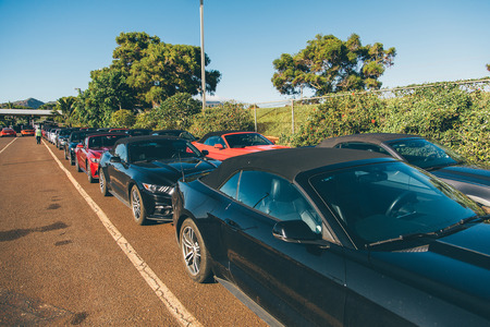 Hundreds of Ford Mustangs standing in a row on the Hawaii islands. Honolulu, USA. August 30, 2017.のeditorial素材