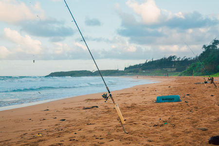Fishing at the beach on the island of Kauai, Hawaiiの写真素材