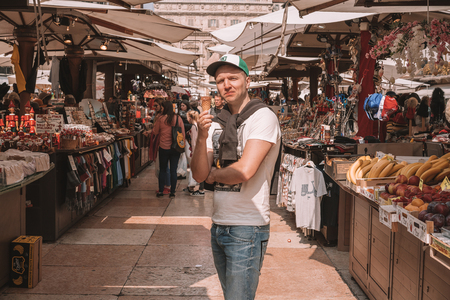 Verona, Italy. April 10, 2018. Aerial view of the old town of Verona with amazing narrow streets, orange rooftops and people in the center of the city.のeditorial素材