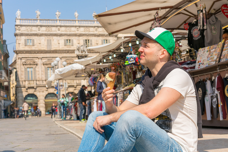 Verona, Italy. April 10, 2018. Aerial view of the old town of Verona with amazing narrow streets, orange rooftops and people in the center of the city.のeditorial素材