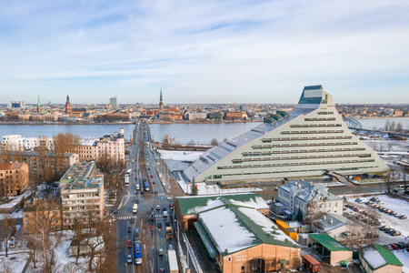 Riga, Latvia. February 10, 2018. Aerial view of Riga National Library from the Pardaugava coast. Beautiful winter day in Riga.のeditorial素材
