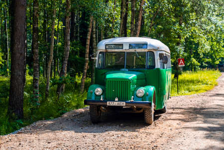 Vintage Soviet bus models exhibited in a yardのeditorial素材