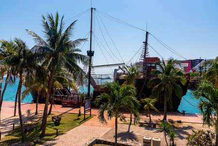 Pirate ships moored on harbor against hotel buildingsのeditorial素材