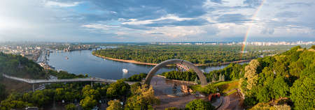 Panoramic view of Kyiv city with a beautiful rainbow over the city.の写真素材