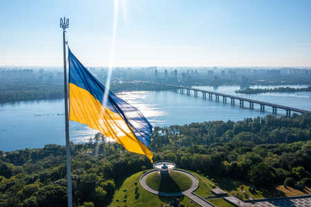 Aerial view of the Ukrainian flag waving in the windの写真素材