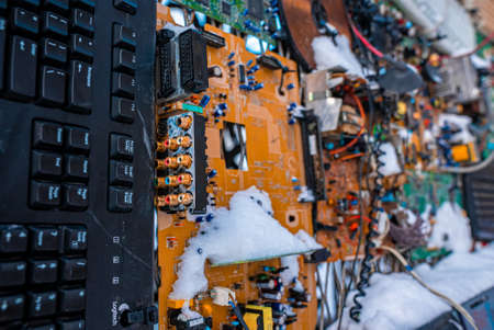 Eco Christmas tree made up of waste, recycled trash and used electronics.