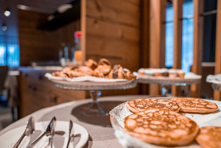 Delicious breakfast ready on table at dining hallの写真素材
