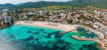 Aerial drone top down photo of small emerald sea tropical portの写真素材