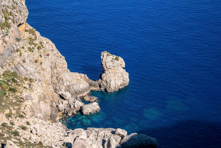 High angle view of Mediterranean sea by rocky cliff during sunny day