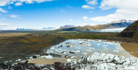 Beautiful glaciers flow through the mountains in Iceland.の写真素材