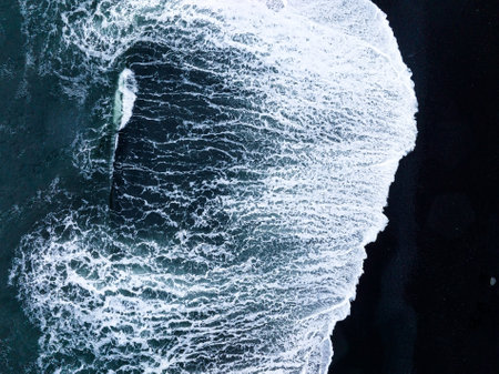 Iceland black sand beach with huge waves at Reynisfjara Vik.の写真素材