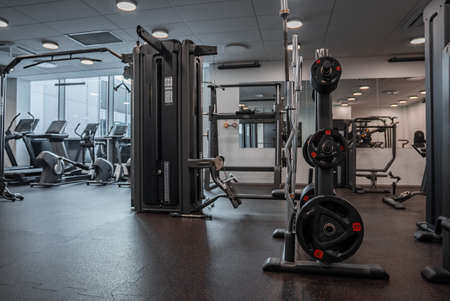 Modern light gym. Sports equipment in gym.の写真素材