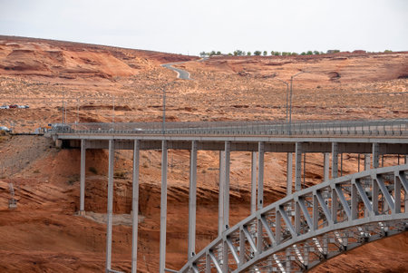 Metallic Arch And Bridge Against Mountain And Clear Skyの写真素材