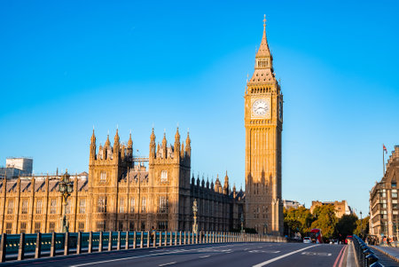 Early empty sunday morning by the Big Ben clock tower and Westminster in London.の写真素材