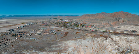 Pile of colorful discarded cars on junkyard in a desertの写真素材