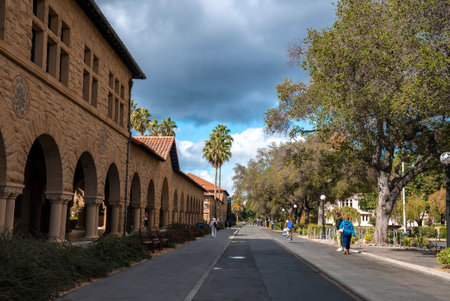 Diminishing perspective of street by historical Stanford University in city