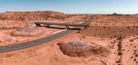 Northern Arizona highway through red rocks and landscape.