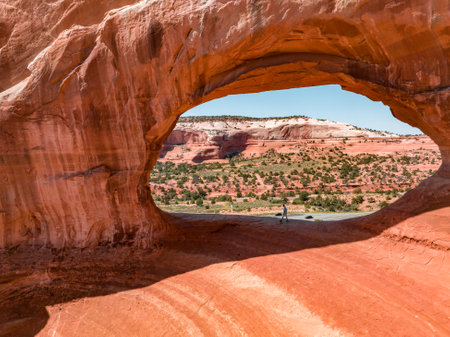 Young man standing in the Arches National Park in Arizona, USA.の写真素材