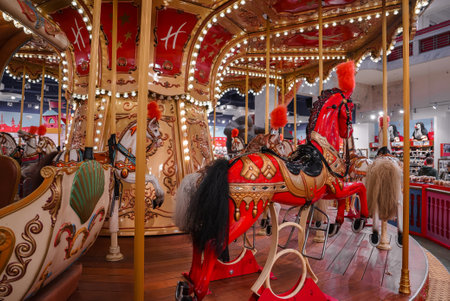 Old French carousel in a holiday park.の写真素材