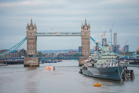 Tower Bridge in London, the UK. Sunset with beautiful clouds.