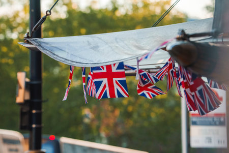 United Kingdom flags hanging over stand in cityの写真素材