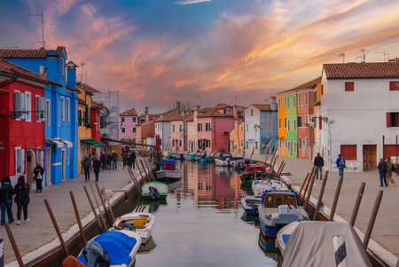 Charming and Colorful Canal with Buildings in Burano, Italy - Picturesque Waterfront Scene with Boatsの写真素材